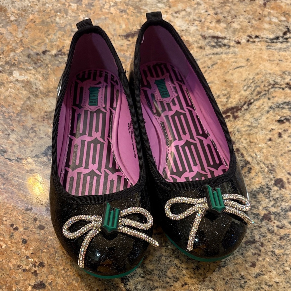Wicked Black Glitter Flats with Bow